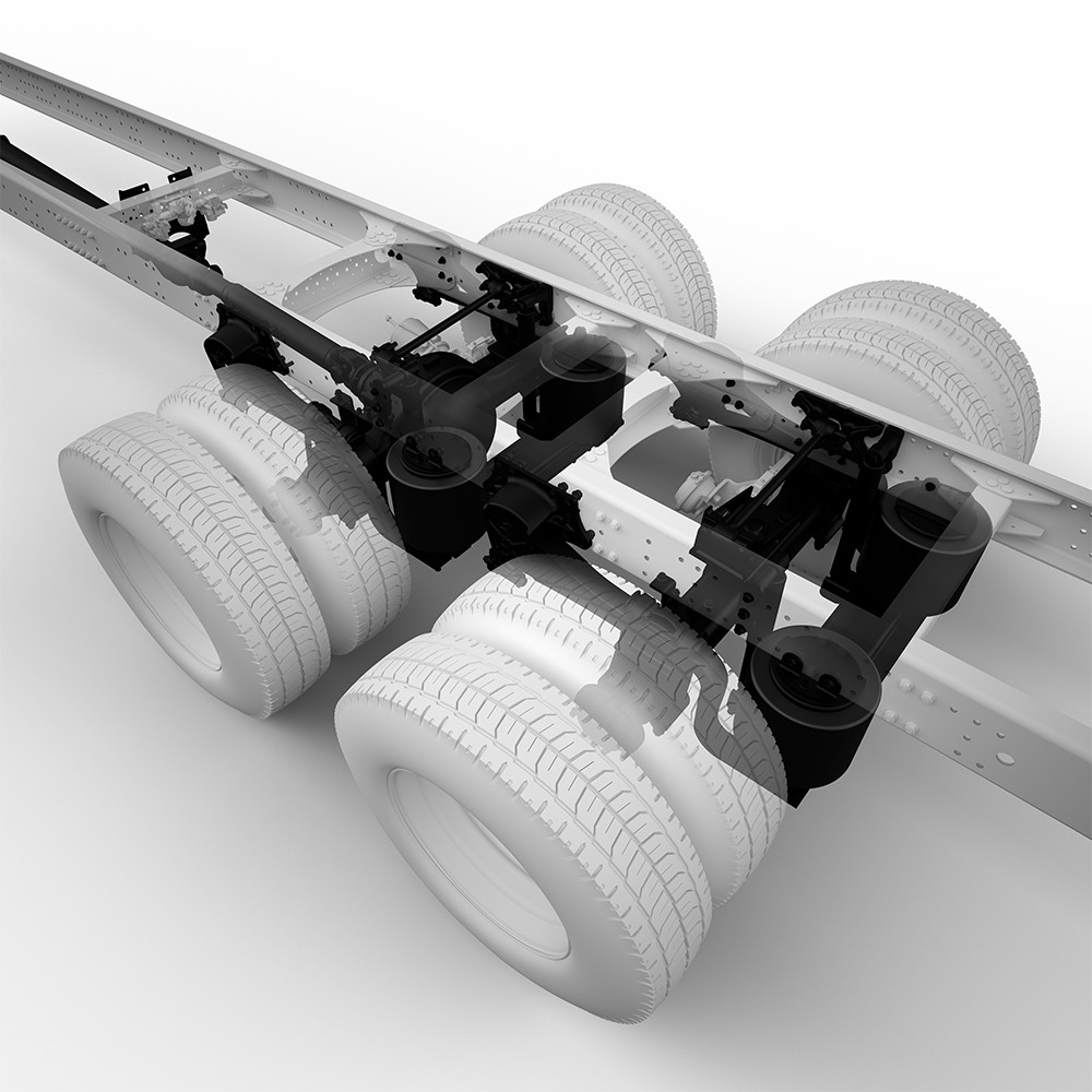 Bahagian casis trak dengan empat tayar dan sistem suspensi berwarna hitam.