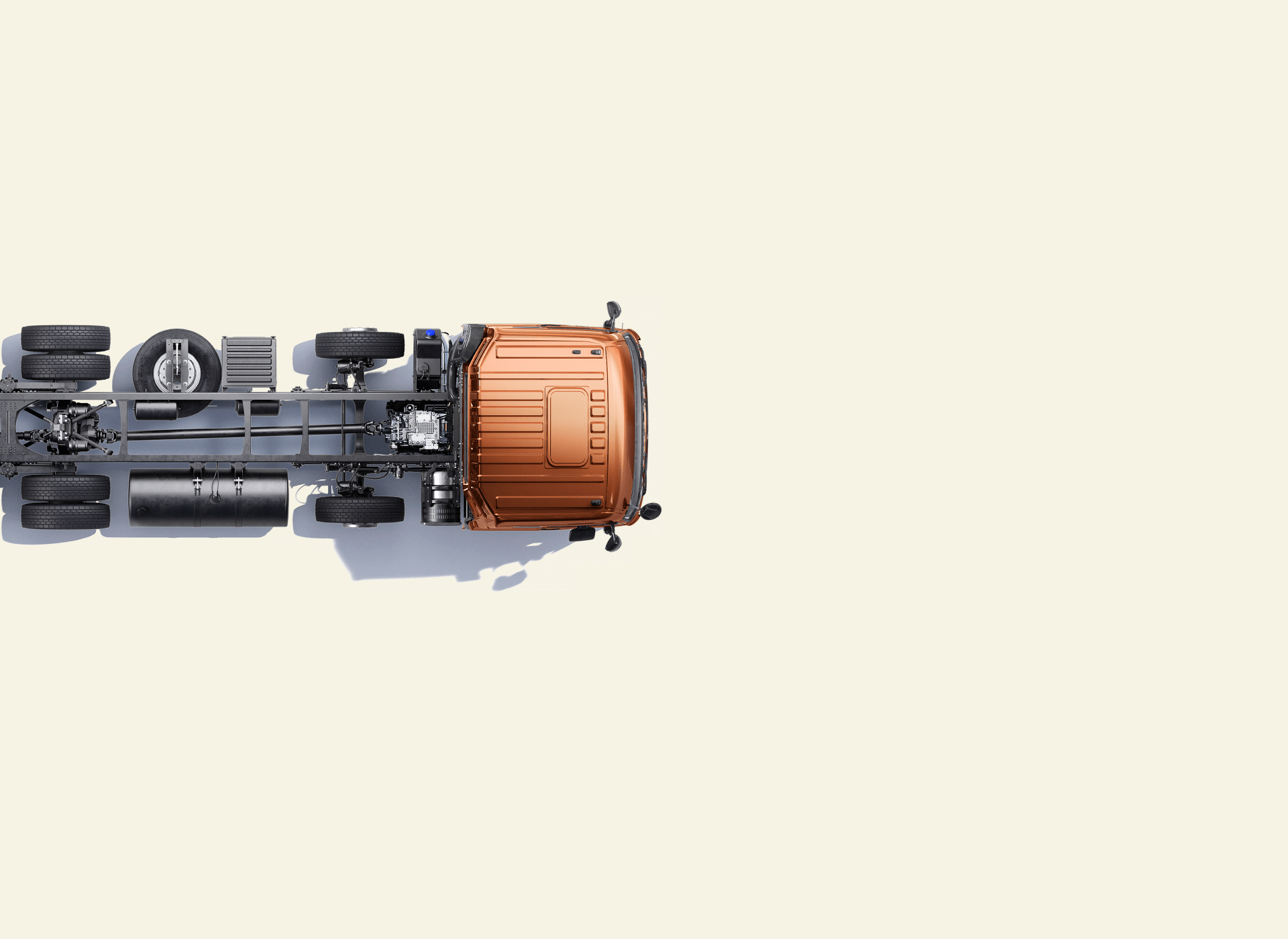 Trak na kulay orange ang unahan, tanaw mula sa itaas, nasa kanang bahagi ng imahe.