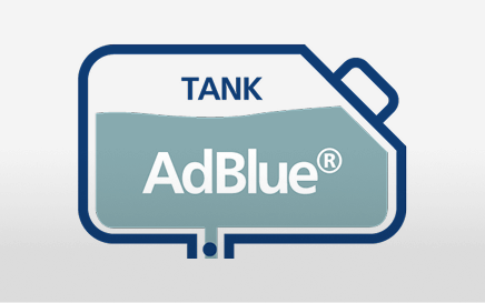 Bình chứa AdBlue với chữ "TANK AdBlue" bên trong.