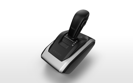 Black and silver gaming joystick controller on a white background.